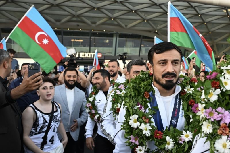 Avropa çempionu olan Azərbaycanın minifutbol millisi Vətənə qayıdıb